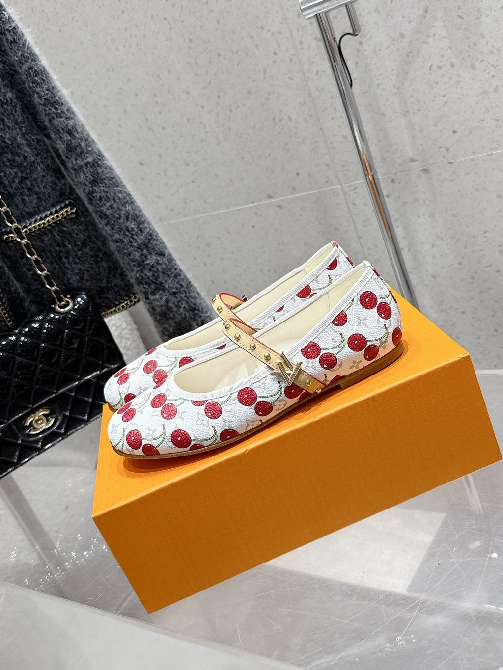 LV Romy Flat Cherry White Monogram Cowhide 610856
