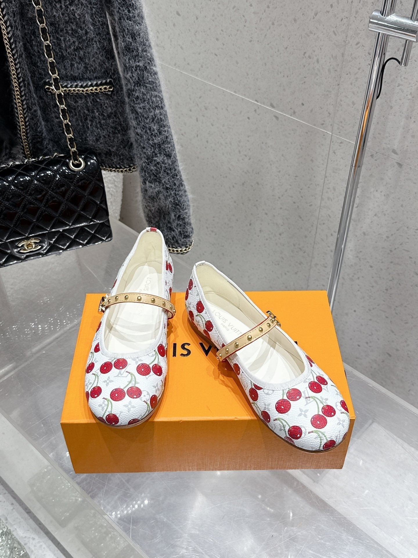 LV Romy Flat Cherry White Monogram Cowhide 610856