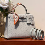 KELLY SELLIER 25 BAG IN PALE GRAY OSTRICH LEATHER WITH SILVER HARDWARE (MADE - TO - ODER)