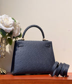 KELLY SELLIER 25 BAG IN PRUSSIAN BLUE OSTRICH LEATHER WITH GOLD HARDWARE (MADE - TO - ODER)