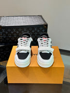LV TRAINER SNEAKERS IN WHITE CALFSKIN AND BLACK SUEDE