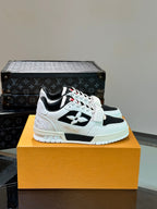 LV TRAINER SNEAKERS IN WHITE CALFSKIN AND BLACK SUEDE