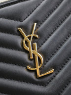 CLUTCH 30 IN BLACK QUILTED CALFSKIN GOLD BUCKLE