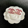DOUBLE C STUD EARRINGS WITH PINK TRIM AND CENTER STONE