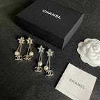 DOUBLE C STUD EARRINGS IN GOLD METAL STAR STONE DOUBLE CHAINS ONE WITH LOGO AND ONE WITH PEARL