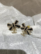 CC Crystals Black Enamel Bow Gold Earrings