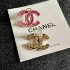 DOUBLE C STUD EARRINGS WITH PINK TRIM AND CENTER STONE