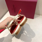 VLOGO SIGNATURE WHITE CALFSKIN FLAT SLINGBACK PUMP WITH GOLD LOGO