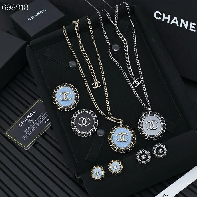 CC 25P STUD EARRINGS IN BLUE DENIM BLACK CALFSKIN-THREADED BUTTON