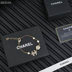 CC BRACELET 25P IN GOLD METAL PEARLY WHITE AND CRYSTAL