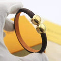LV LEATHER ROPE 2 MOTIFS GOLD BRACELET
