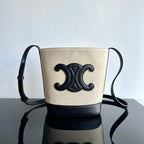 SMALL BUCKET CUIR TRIOMPHE 24CM IN STRIPED TEXTILE AND BLACK CALFSKIN